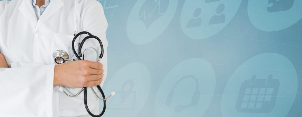 Digital composition of mid section of doctor standing with arms crossed against hospital icons in background
